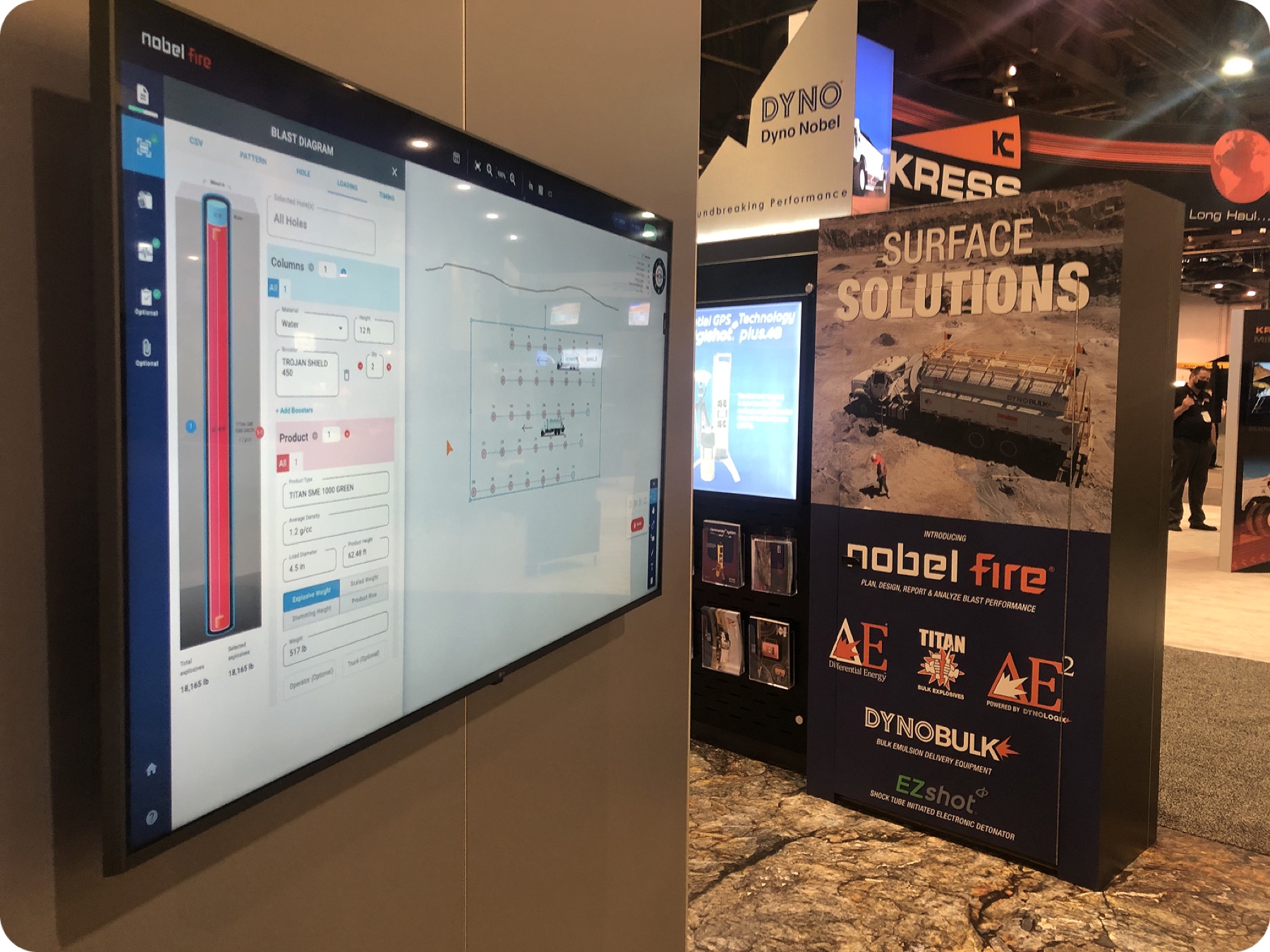 Nobel Fire's blast diagram tool shown on a wall-mounted screen at the Mine Expo booth
