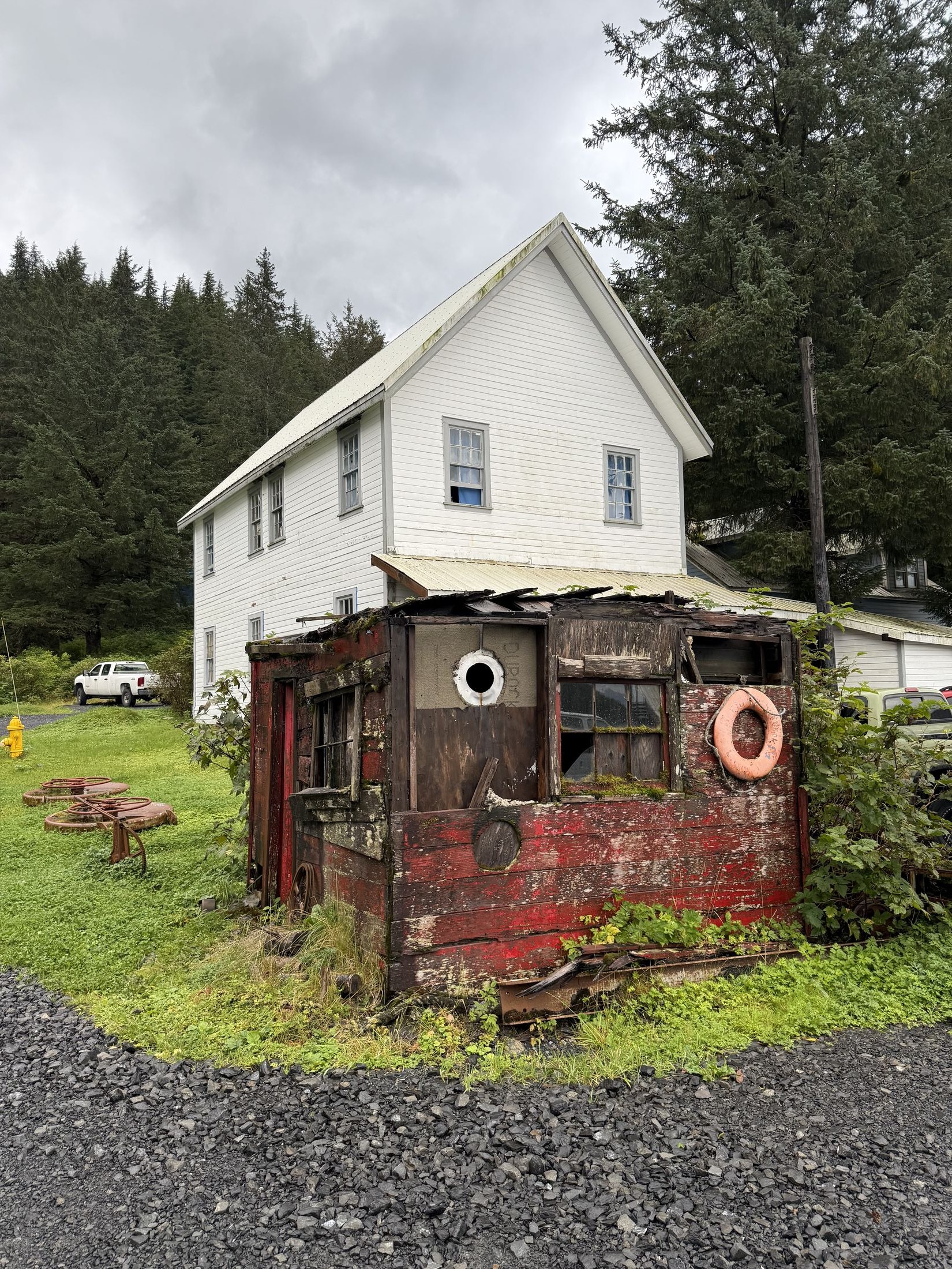 Weathered homestead outbuilding in the trees, Alaska