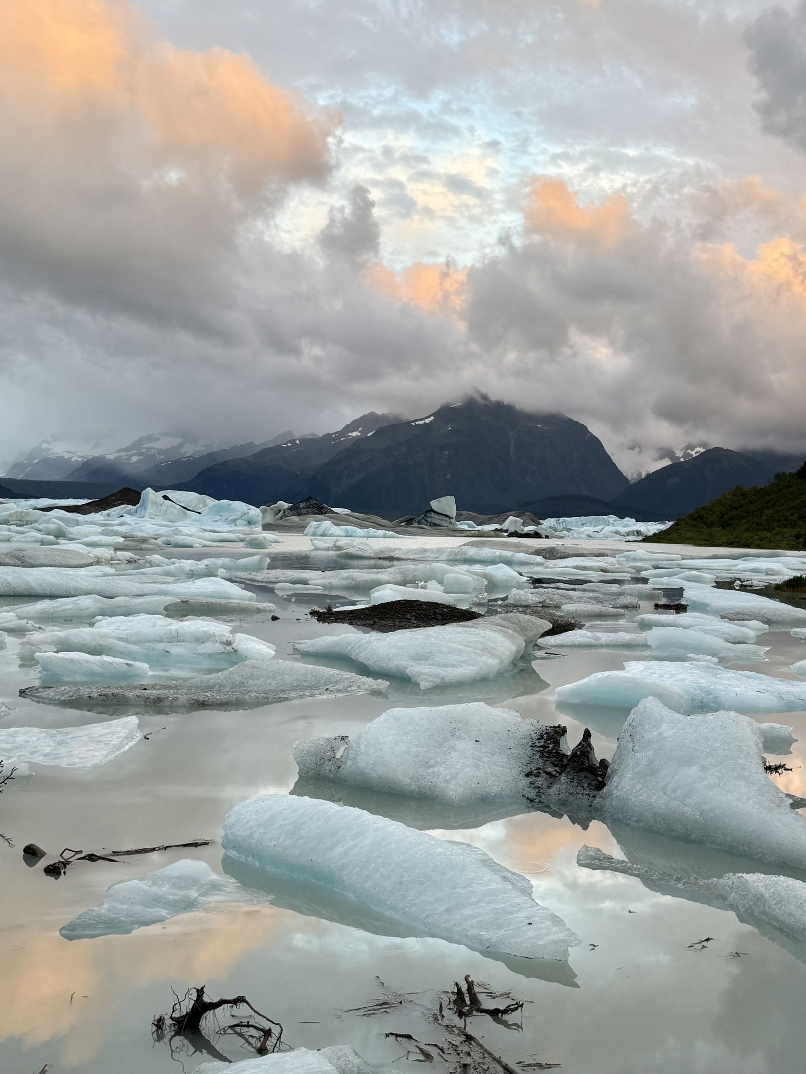 Icebergs in a glacial lake at sunset, Alaska
