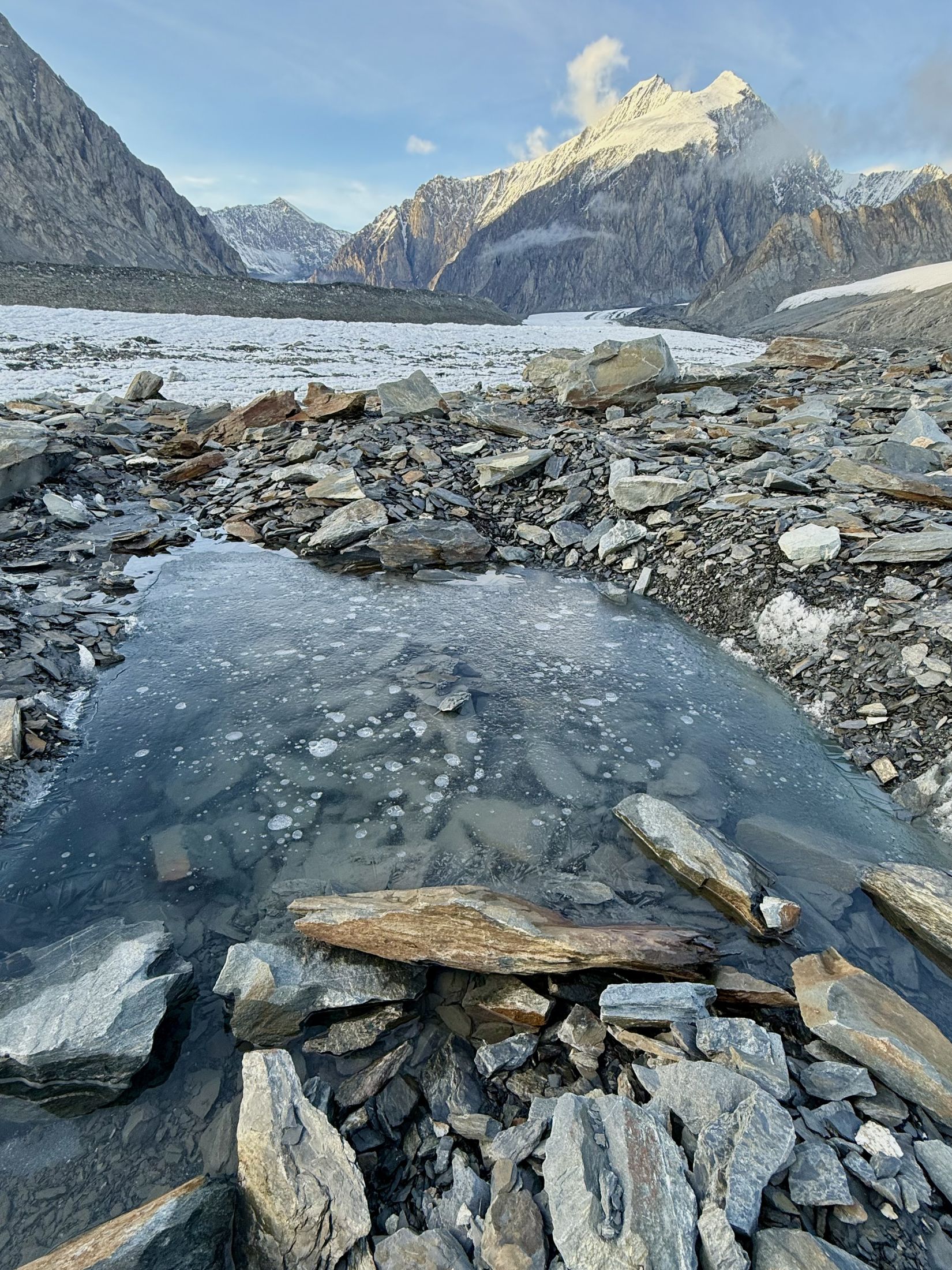 Snow-capped peak above a glacier, Alaska