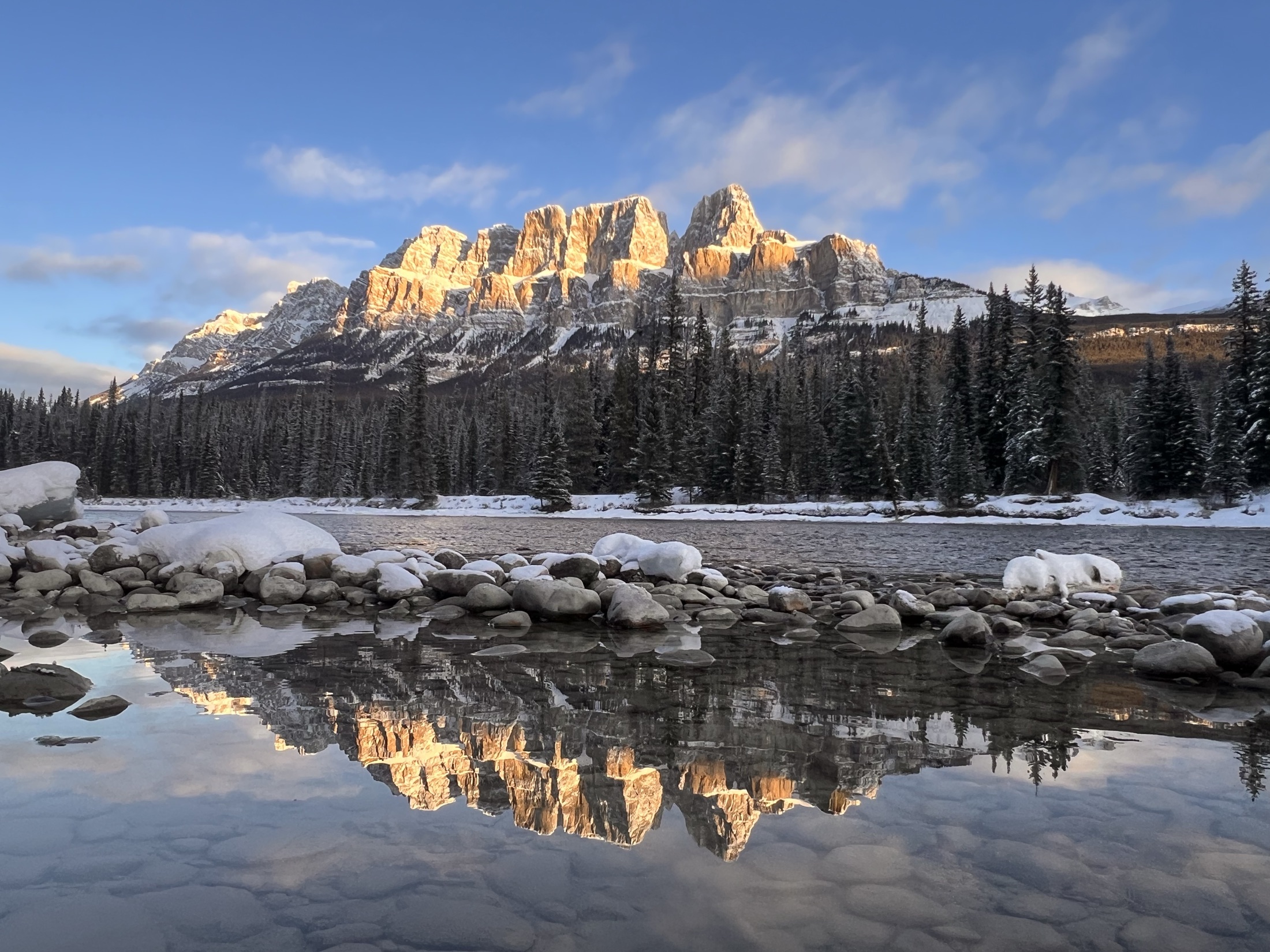Castle Mountain reflected in the Bow River at sunset, Banff